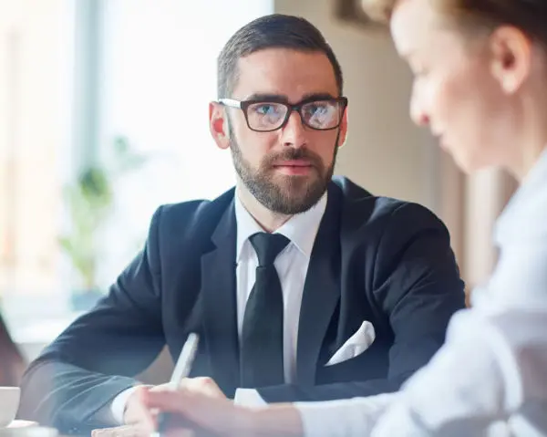 colleagues-meeting-scaled-e1706560865396-600x479